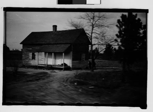 [Wooden House by Road, From Moving Automobile, Macon, Georgia]