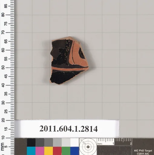 Terracotta fragment of a kylix (drinking cup)