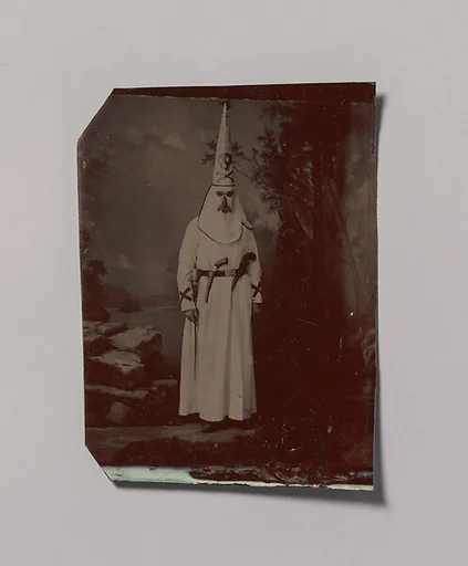 [Ku Klux Klansman with Two Pistols and a Sword]