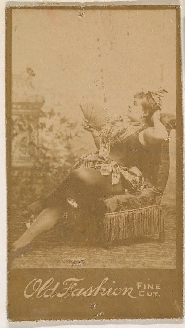 Actress reclining on chair, from the Actresses series (N664) promoting Old Fashion Fine Cut Tobacco — Unknown