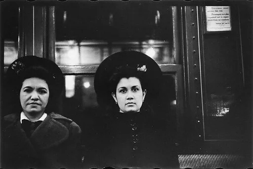 [Five 35mm Film Frames: Subway Passengers, New York City: Two Women in Hats]