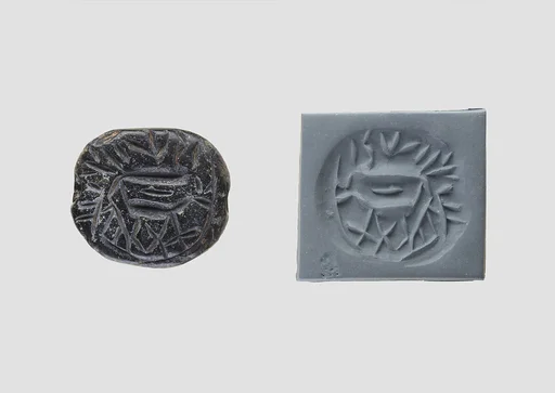 Low hemispheroid seal with later inscription