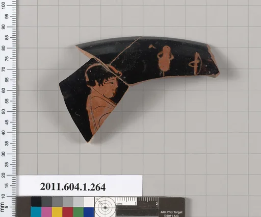 Terracotta fragment of a kylix (drinking cup)