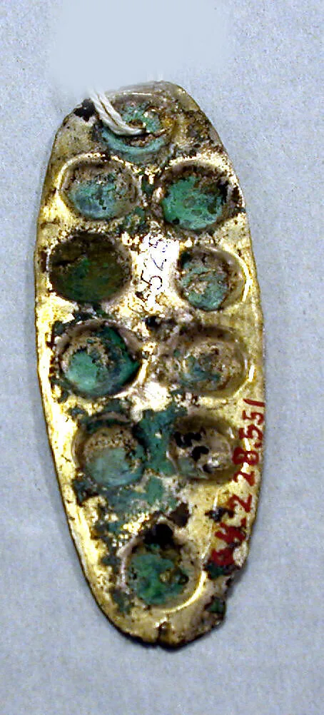 Hammered Silver Ornament with Repoussé Disks — Unknown