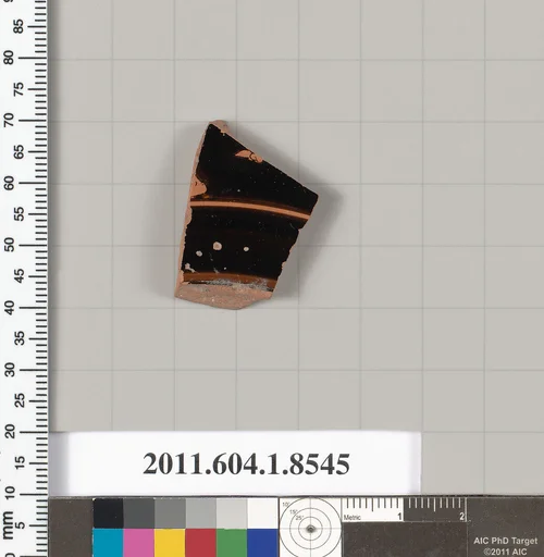 Terracotta fragment of a stemless kylix (drinking cup)