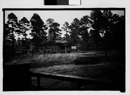 [Wooden House by Railroad Tracks, From Train, Savannah, Georgia]