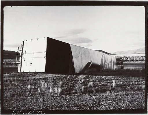 [Overturned tractor-trailer]