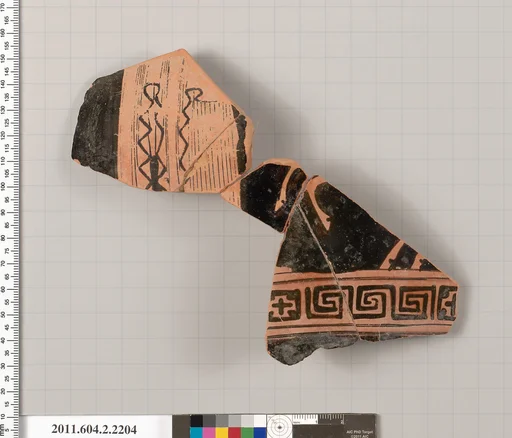 Terracotta fragment of a pot; unglazed on the inside