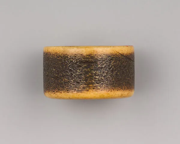 Bone, Dark Brown Archer's Ring — Unknown