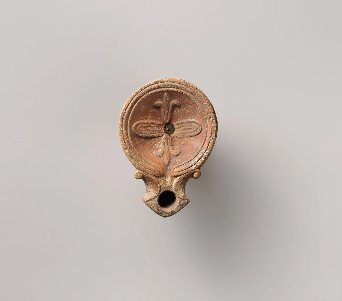 Terracotta oil lamp — Unknown