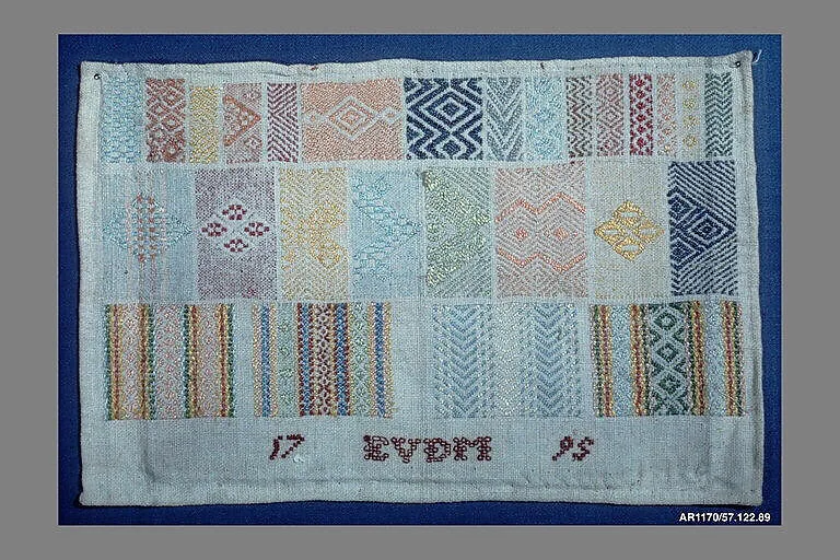Embroidered darning sampler — Unknown