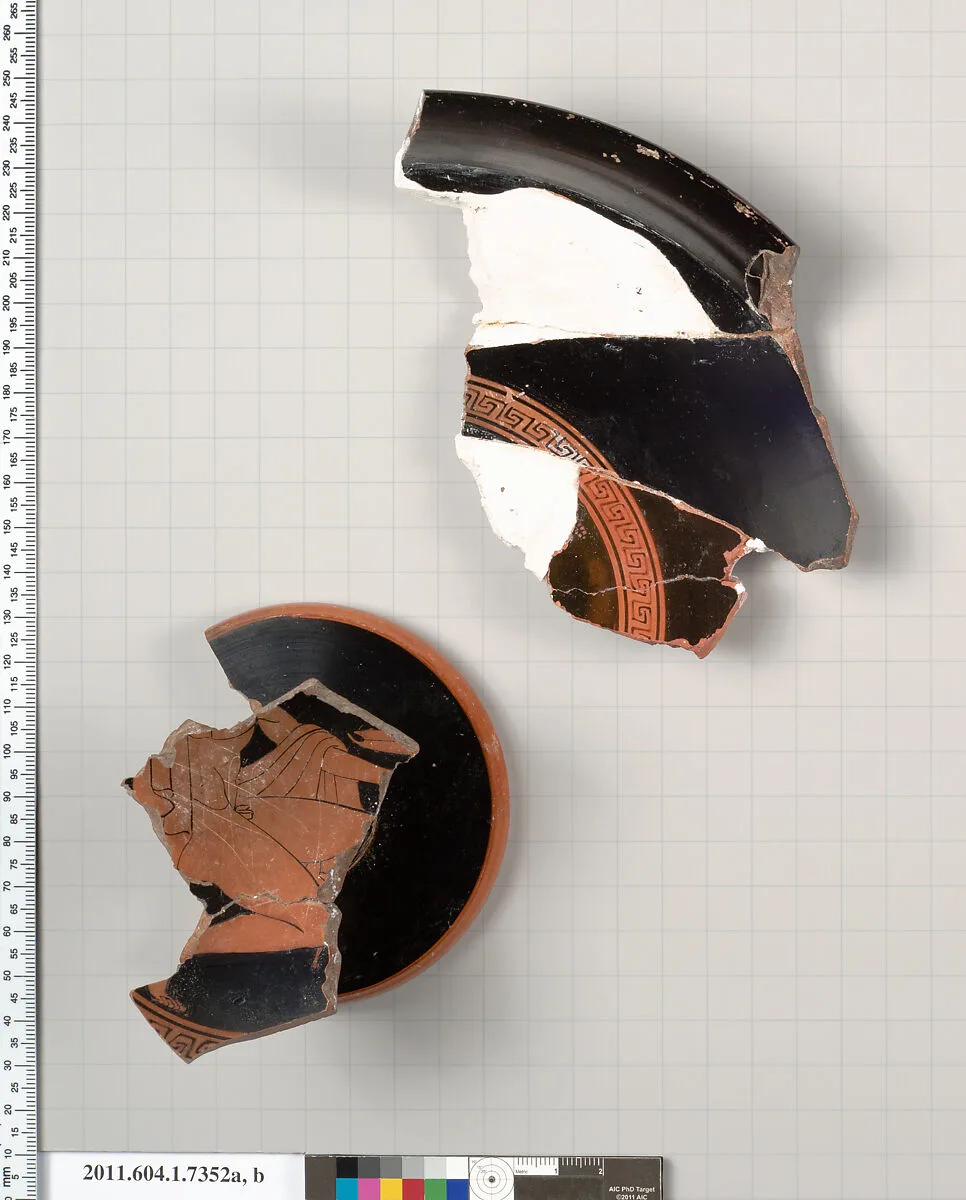 Terracotta fragments of a kylix (drinking cup) — Makron