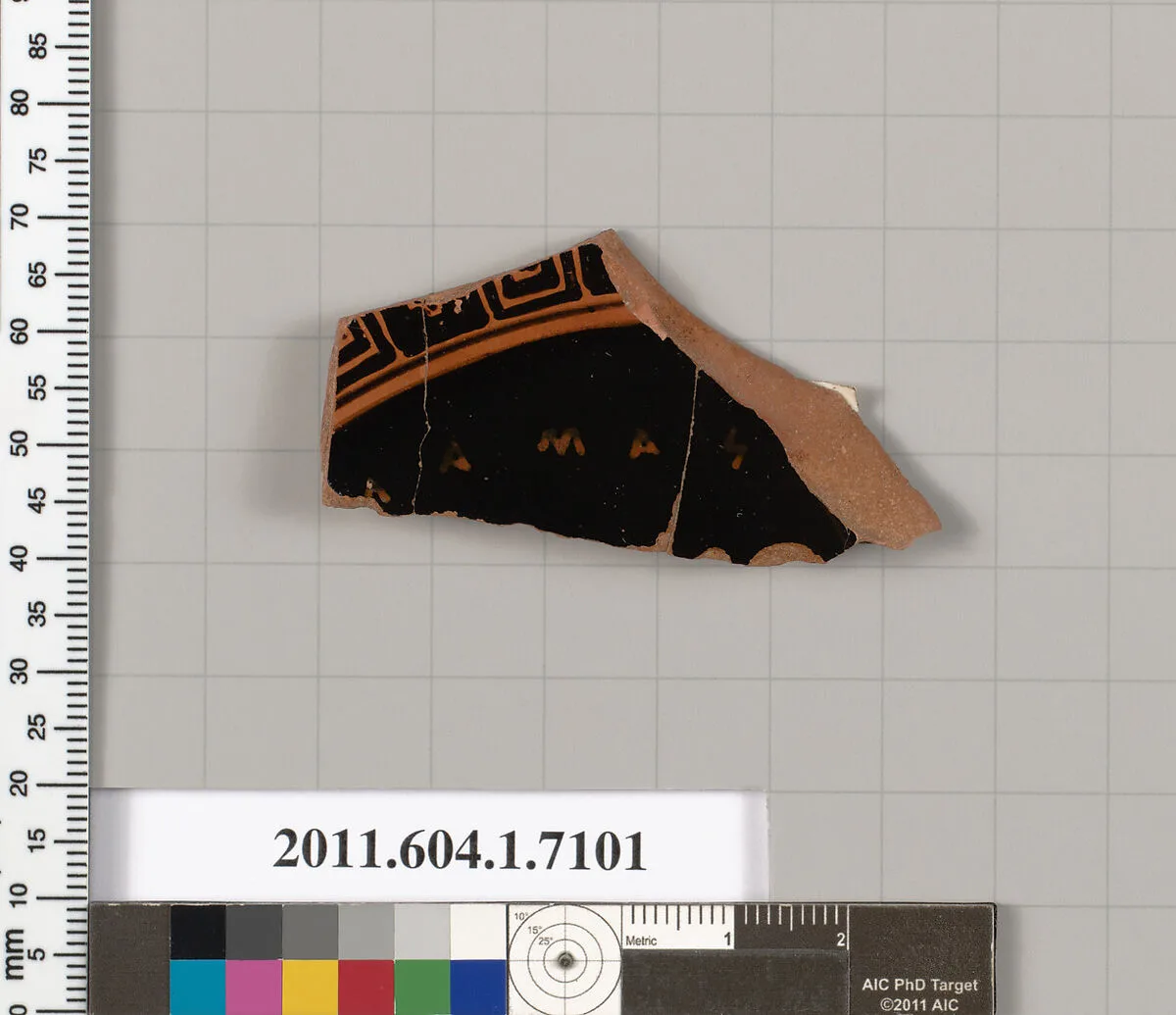 Terracotta fragment of a kylix (drinking cup) — Douris