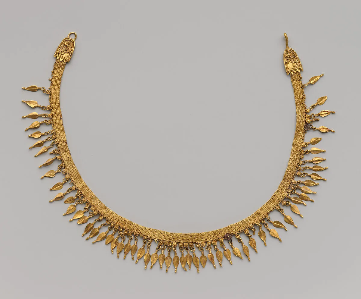 Gold strap necklace with beechnut pendants — Unknown
