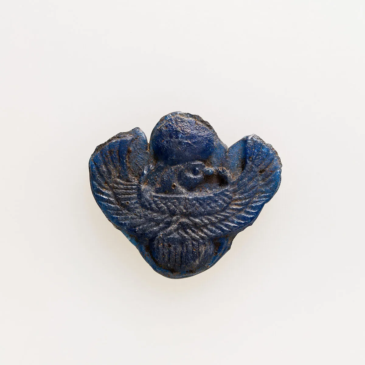 Amulet of winged scarab with falcon head — Unknown