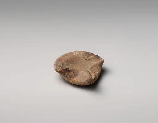 Terracotta saucer-shaped lamp