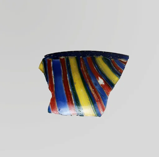 Glass striped mosaic bowl fragment