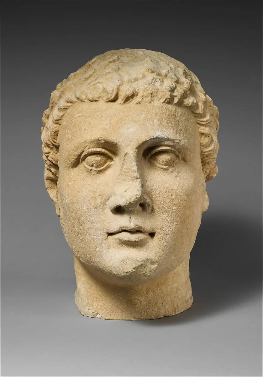 Limestone head of beardless male votary — Unknown