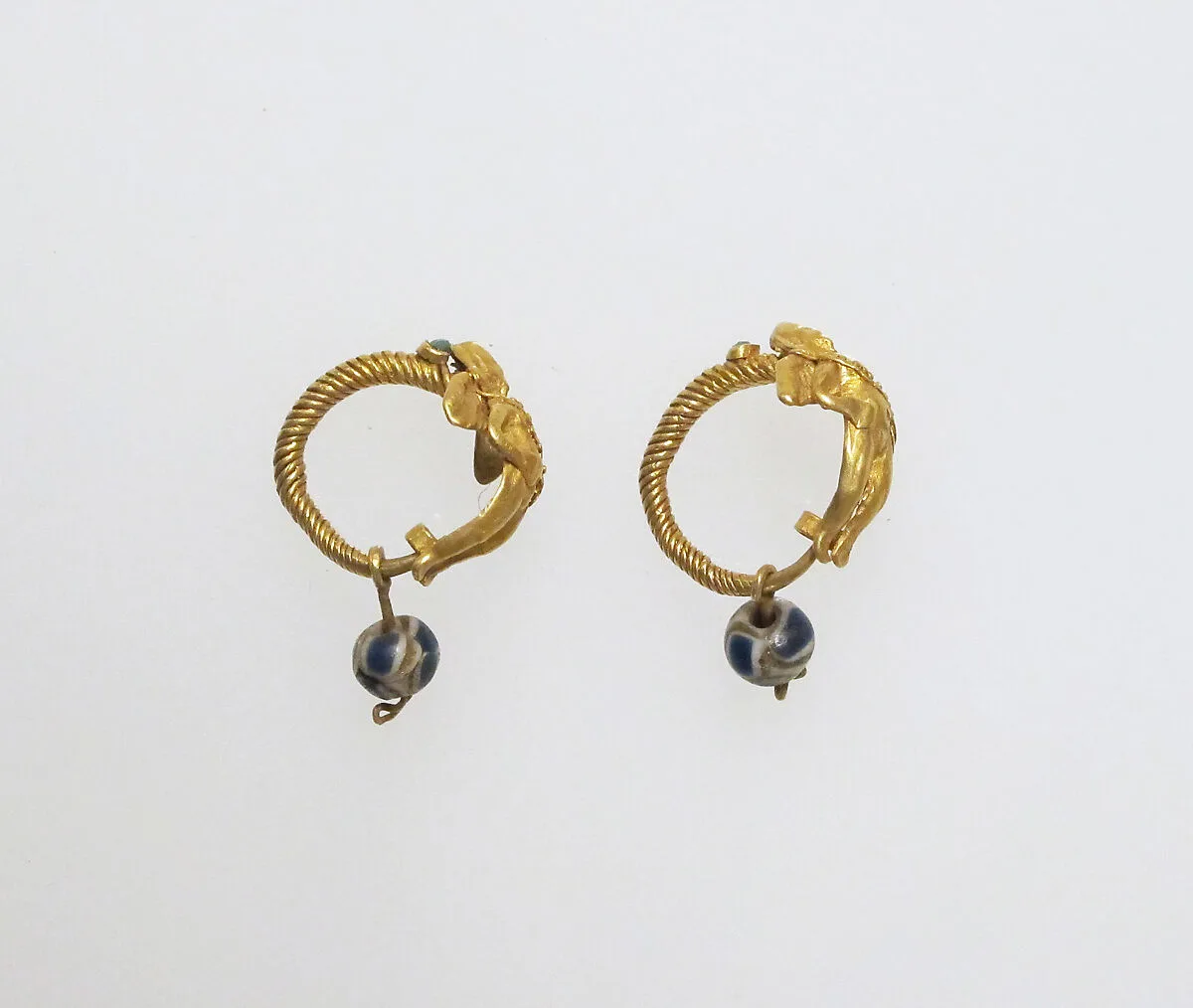 Earring with Eros and paste beads — Unknown