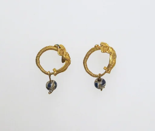 Earring with Eros and paste beads