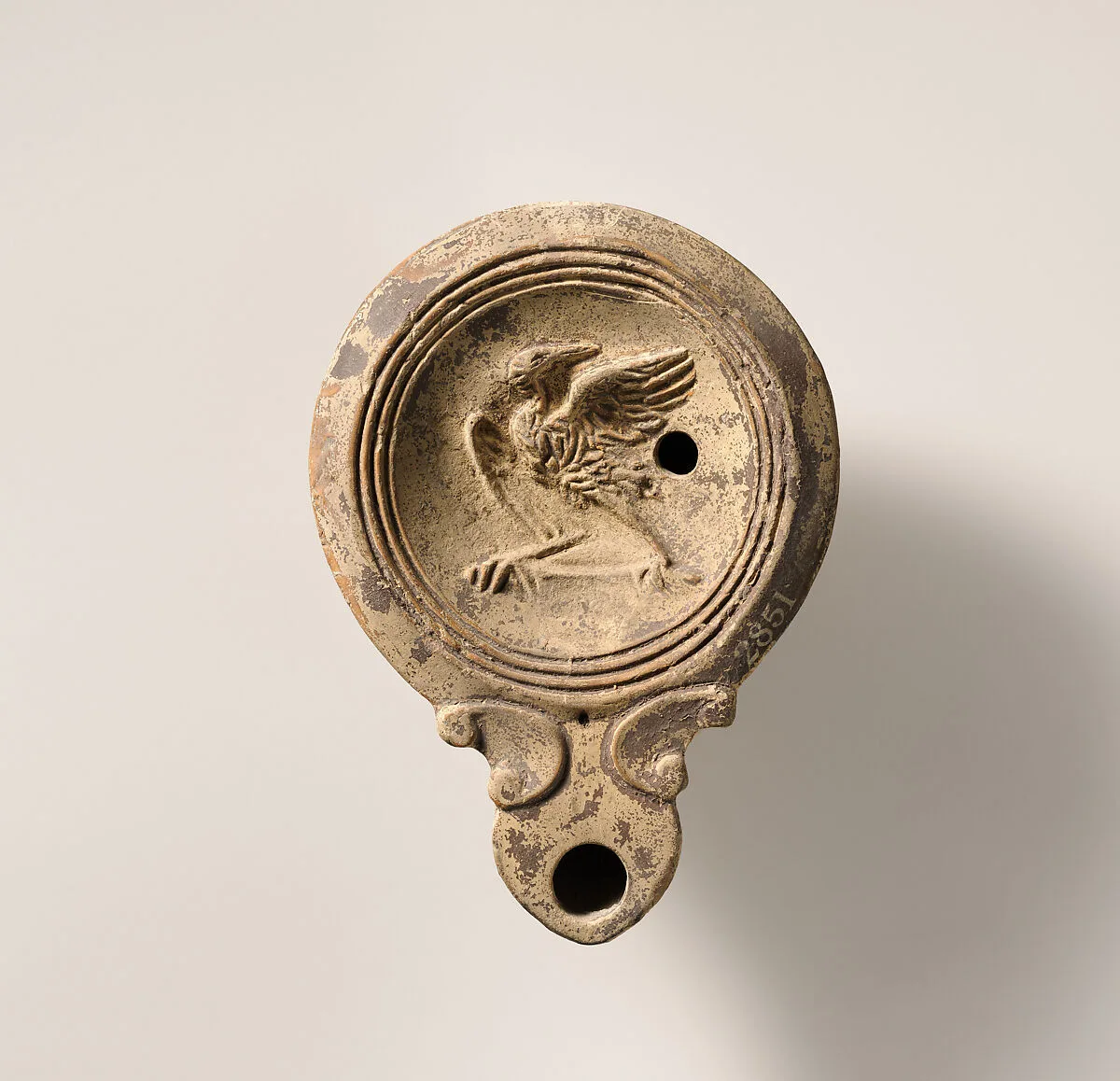 Terracotta oil lamp — Unknown