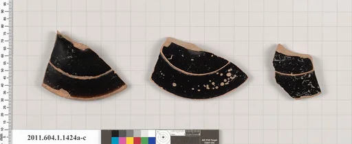 Terracotta fragments of kylikes (drinking cups)