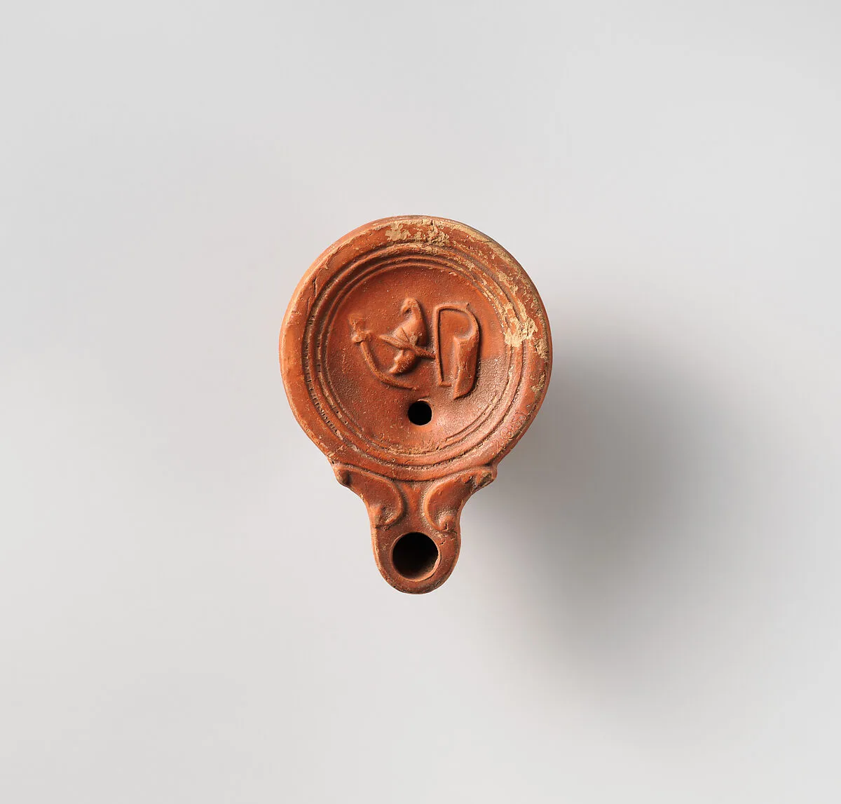 Terracotta oil lamp — Unknown
