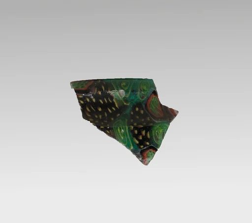 Glass mosaic carinated bowl fragment