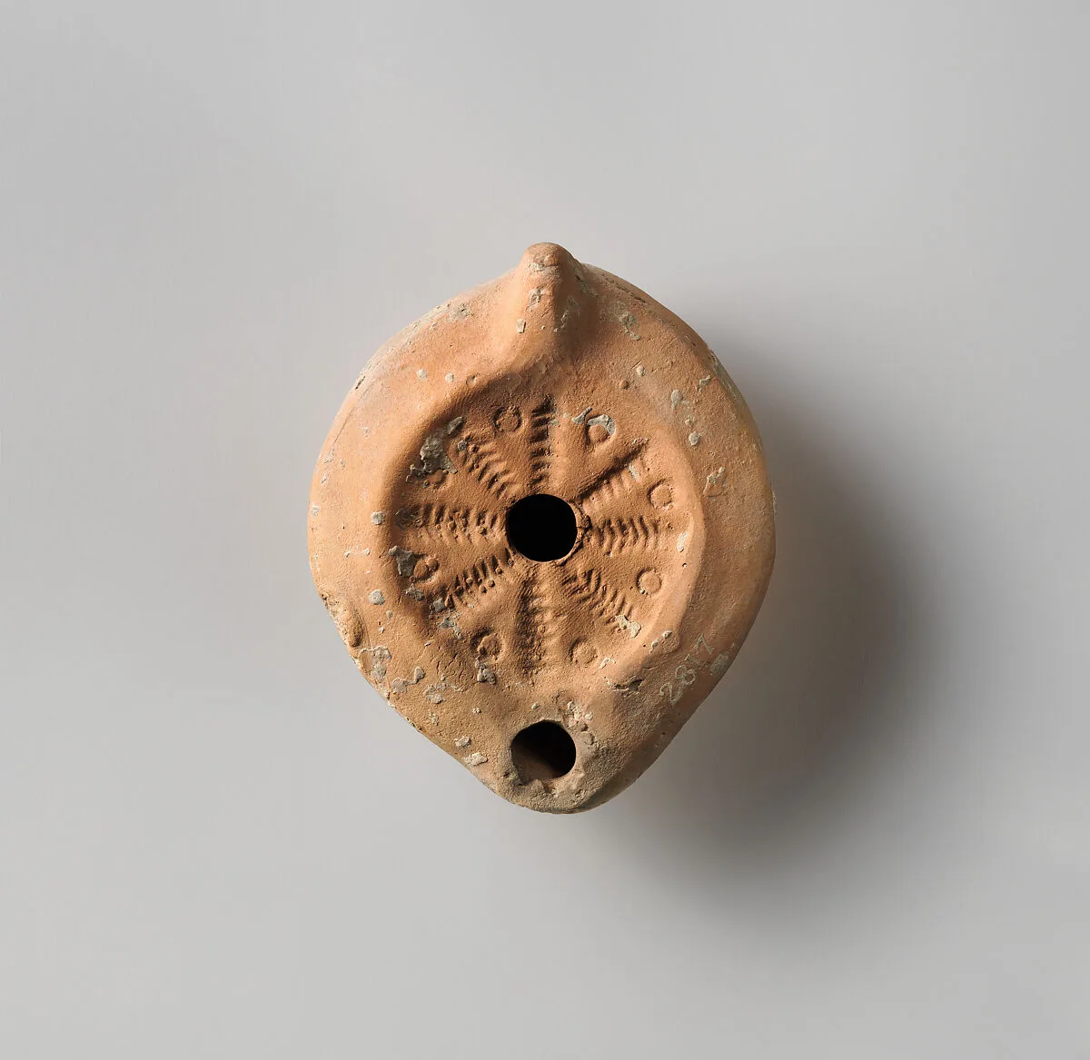 Terracotta oil lamp — Unknown