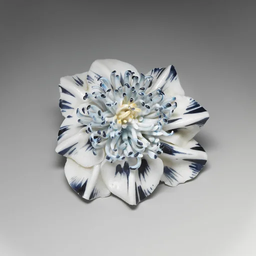 Porcelain flower (one of a set of nine)