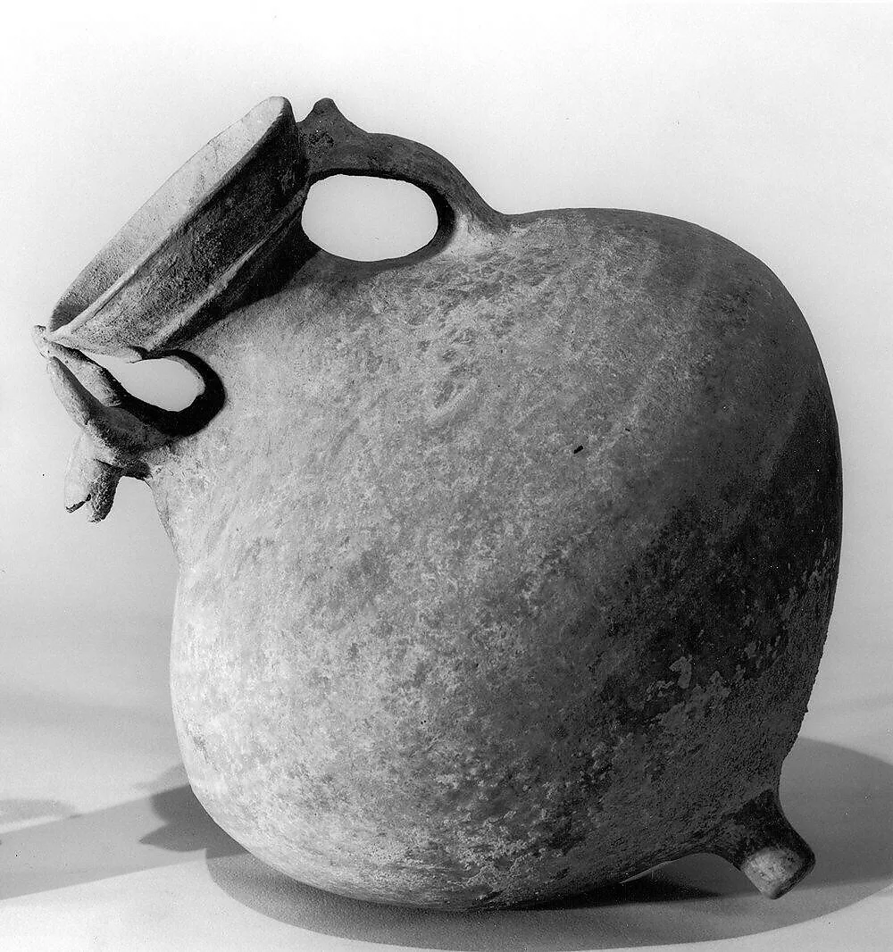 Twin-spouted vessel with animal head spout — Unknown