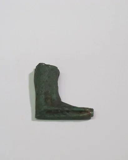 Mold-pressed amulet or fragment