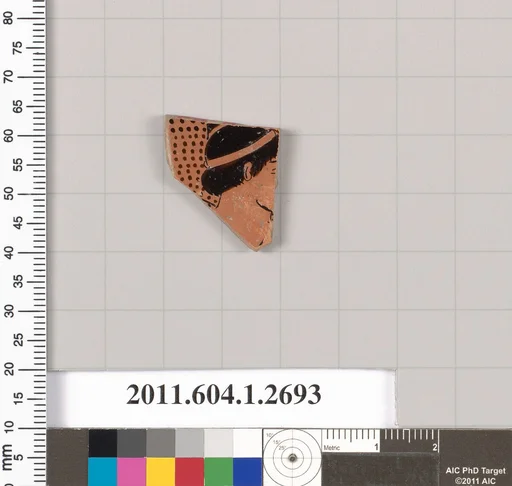 Terracotta fragment of a kylix (drinking cup)