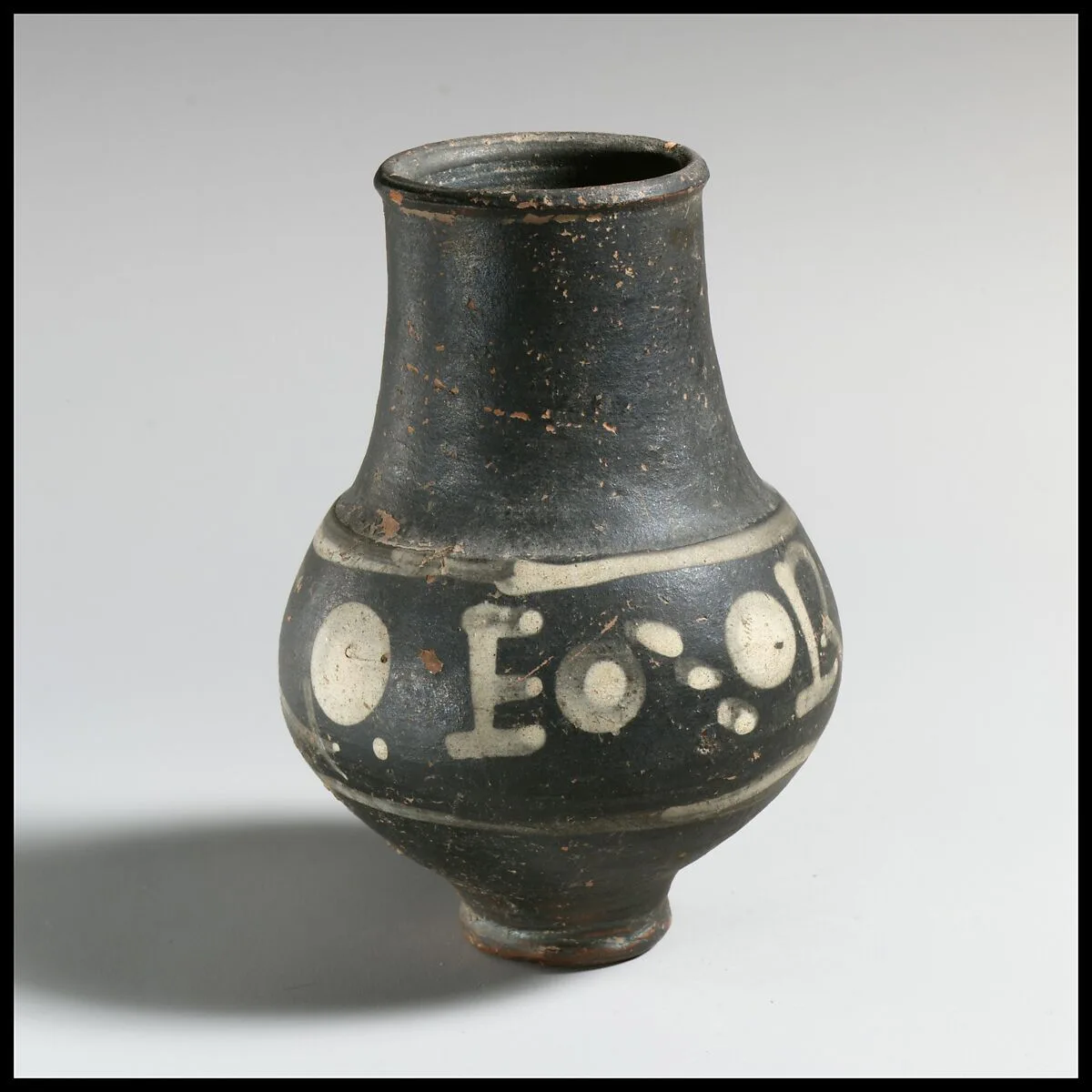 Terracotta beaker with painted inscription — Unknown