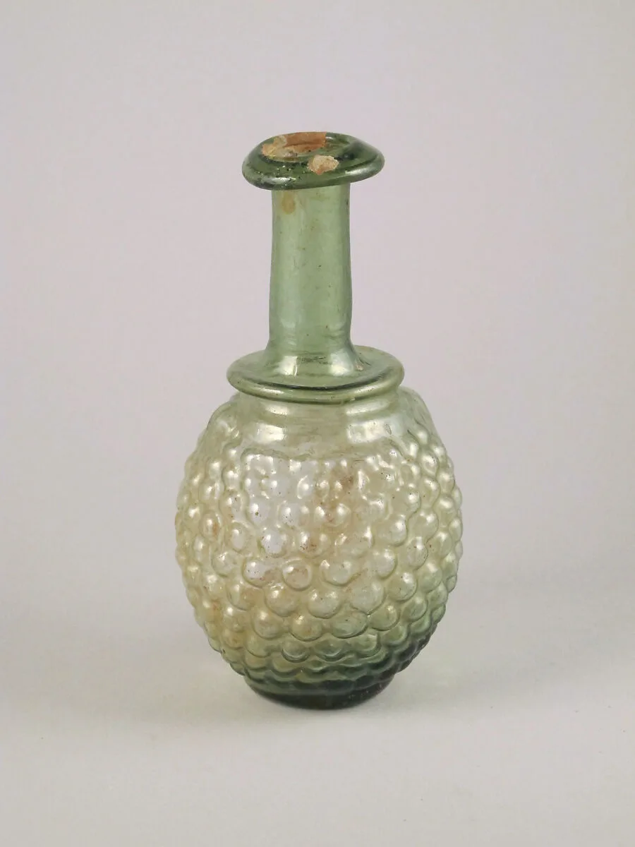 Glass bottle in the shape of a bunch of grapes — Unknown