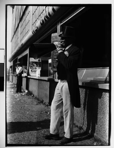 [Barker with Megaphone Outside Food Stand, New York City]