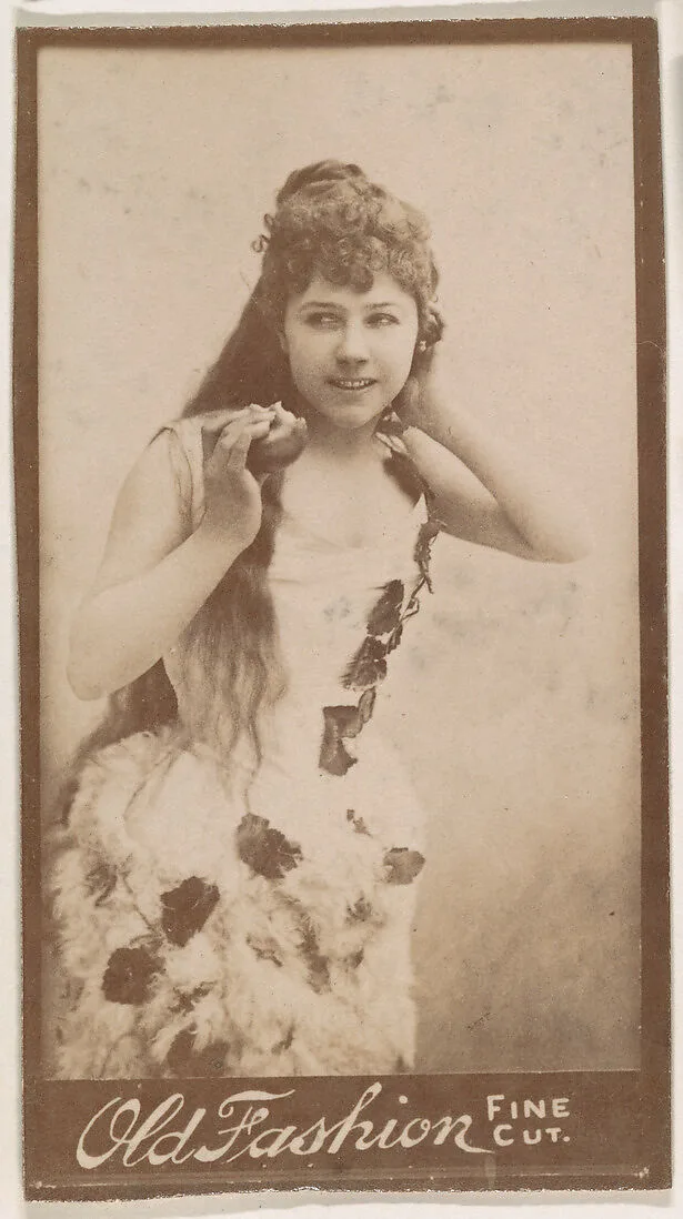 Actress holding apple, from the Actresses series (N664) promoting Old Fashion Fine Cut Tobacco — Unknown