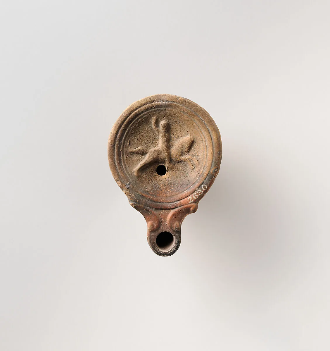 Terracotta oil lamp — Unknown