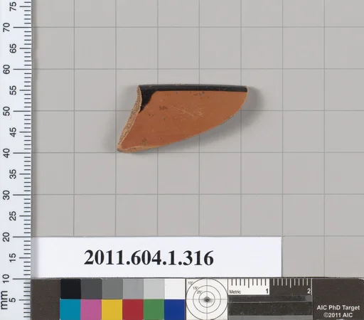 Terracotta rim fragment of a kylix (drinking cup)