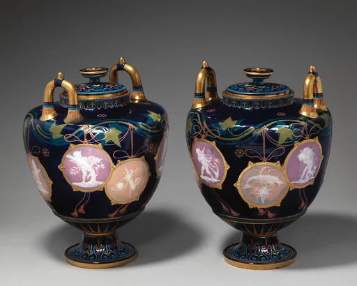 Pair of "Pompeian" vases with covers