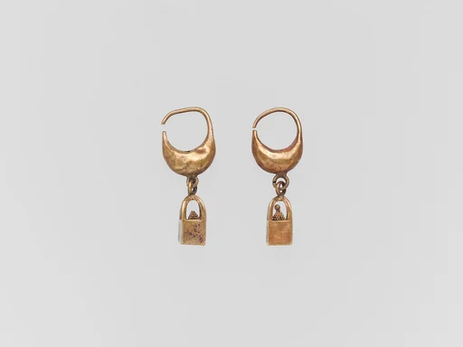 Gold earring with cage and ball pendant