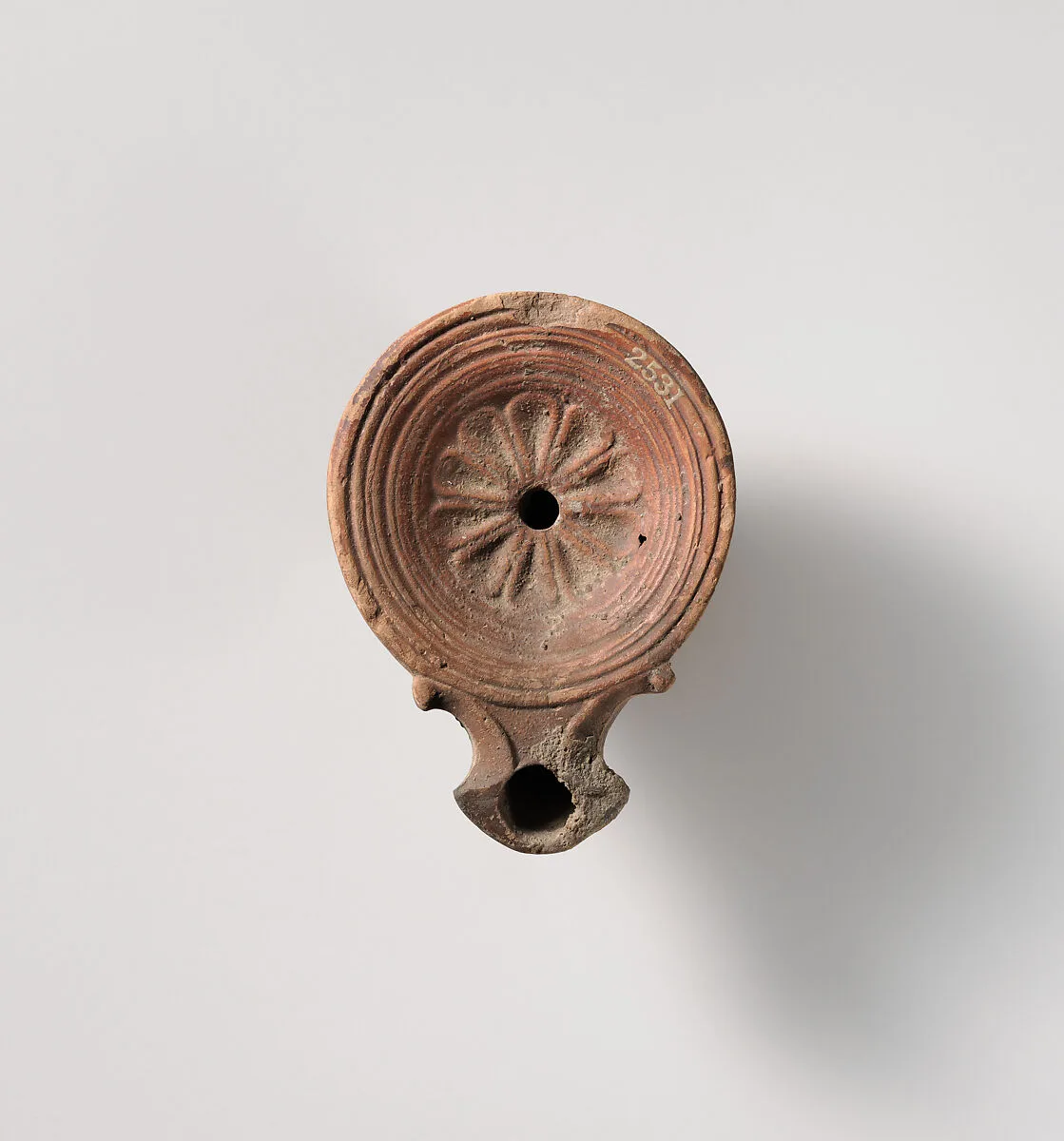 Terracotta oil lamp — Unknown