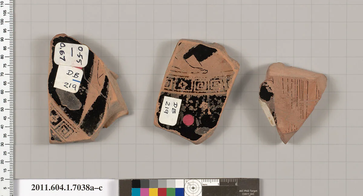 Terracotta fragments of a kylix (drinking cup) — Douris