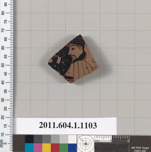 Terracotta fragment of a kylix (drinking cup)