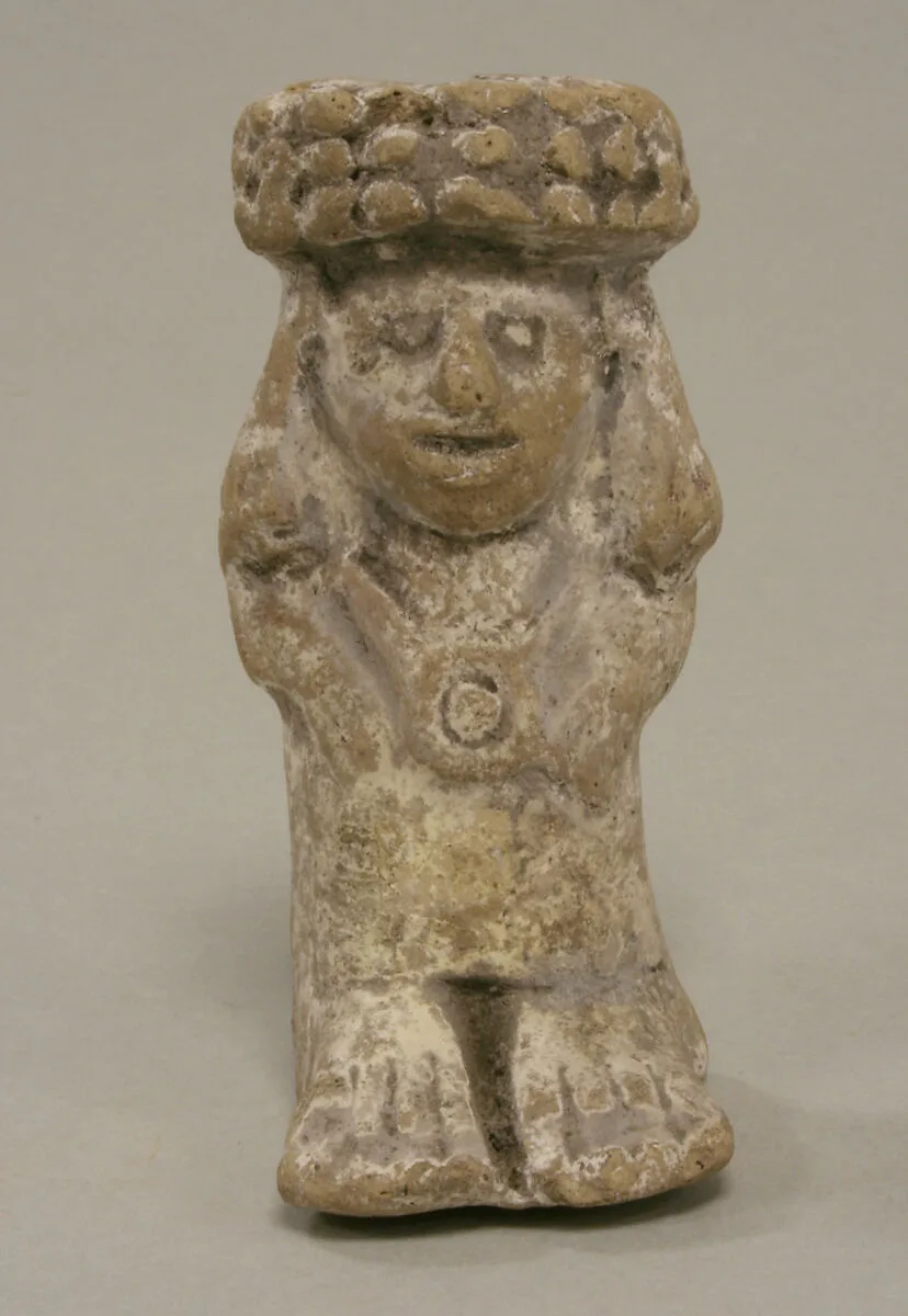 Standing Female with Headdress — Unknown