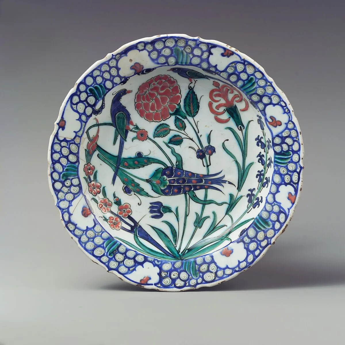 Dish Depicting Two Birds among Flowering Plants — Unknown