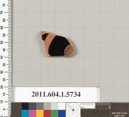 Terracotta fragment of a kylix: eye-cup (drinking cup)