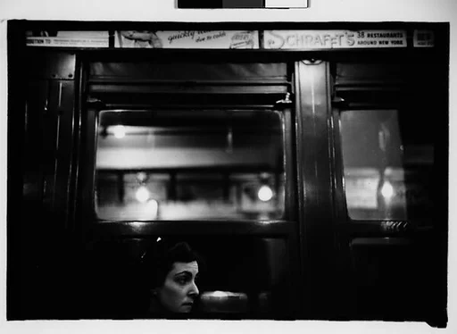 [Two 35mm Film Frames: Subway Passengers, New York City: Woman, Man Reading, Older Woman in Flowered Hat]