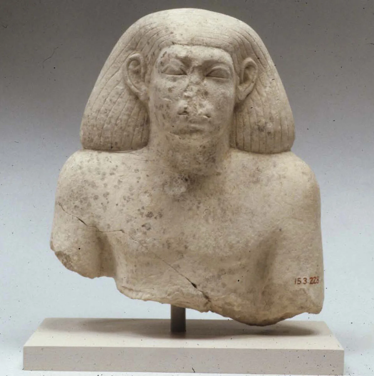 Upper part of male statue — Unknown