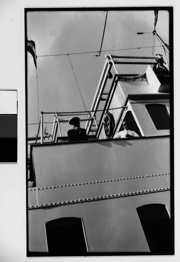 [Two Men on Deck of Ship]